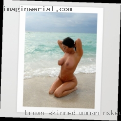 Brown skinned woman naked girl masturbating.